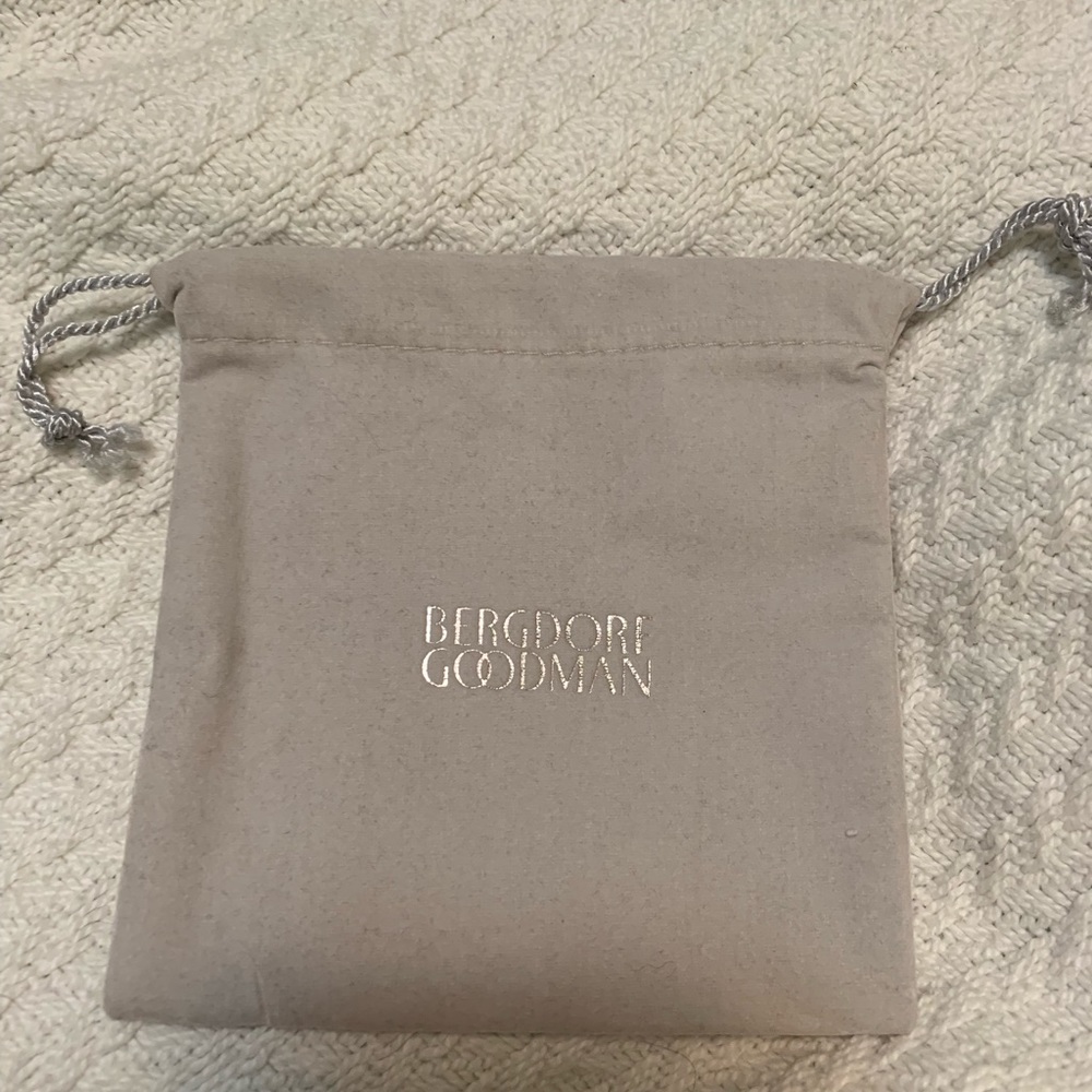 Bergdorf Goodman jewelry bag silver logo 4x4” new